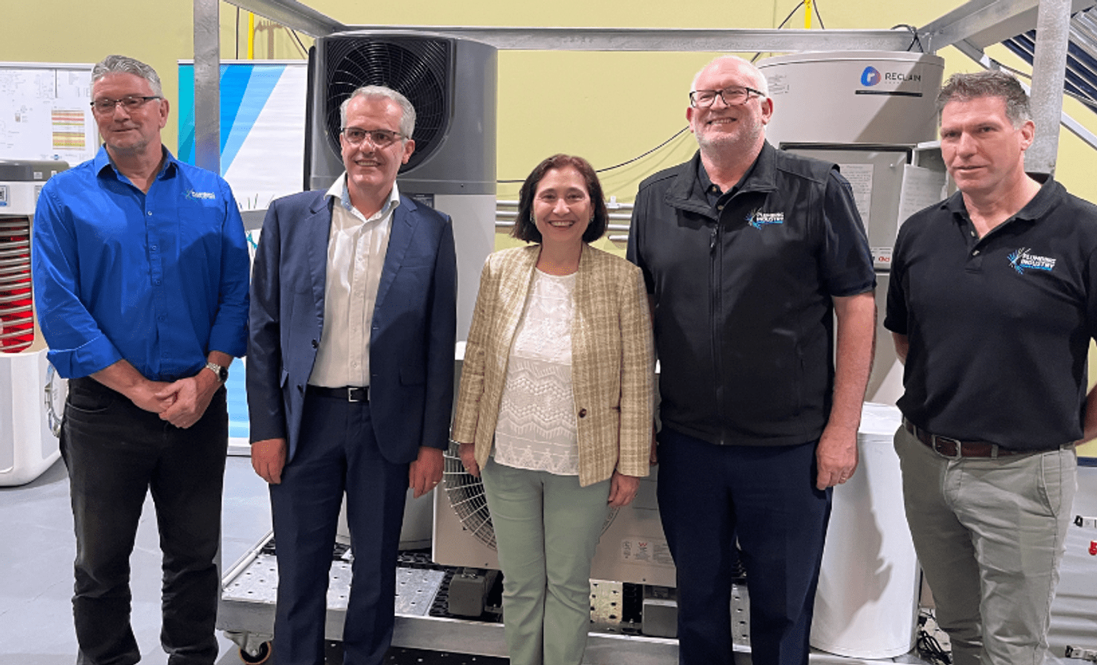 CEO of Solar Victoria Stan Krpan PSM FAICD, Minister for Energy and Resources Lily D’Ambrosio with Plumbing Industry Climate Action Centre team members